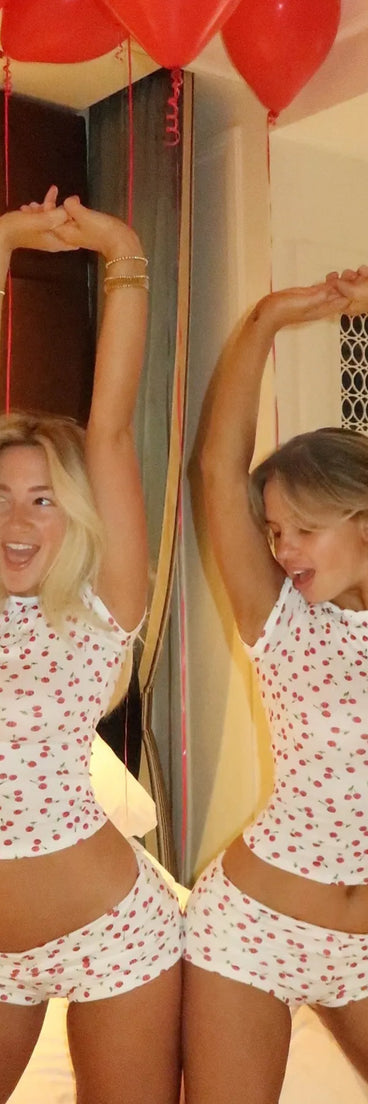 Get inspired with the So Juicy Cherry Print Pajama Top, a feed-worthy white piece that’s part of Windsor's updated and curated women’s clothing edit packed with must-have fall outfit ideas.