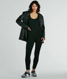 The Easy Going Scoop Neck Seamless Knit Jumpsuit, a women's black jumpsuit, is a chic one-piece outfit for parties and celebrations offering a glamorous look with festive style and on-trend design accents.