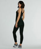 The Easy Going Scoop Neck Seamless Knit Jumpsuit, a women's black jumpsuit, is a chic one-piece outfit for parties and celebrations offering a glamorous look with festive style and on-trend design accents.