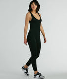 The Easy Going Scoop Neck Seamless Knit Jumpsuit, a women's black jumpsuit, is a chic one-piece outfit for parties and celebrations offering a glamorous look with festive style and on-trend design accents.