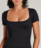 Create bold, fashion-forward looks for spring or summer with the Stylish Strut Seamless Knit Flared Leg Catsuit in black, a must-have piece from Windsor’s collection of stylish bottoms for women.