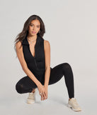 The Off Duty Chic Sleeveless Collared Zip-Up Catsuit is a trendy women's bottom in black, designed with modern details and alluring textures to complete chic outfits for 2025.