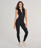 The Off Duty Chic Sleeveless Collared Zip-Up Catsuit is a trendy women's bottom in black, designed with modern details and alluring textures to complete chic outfits for 2025.
