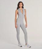 The Off Duty Chic Sleeveless Collared Zip-Up Catsuit is a trendy women's bottom in heather gray, designed with modern details and alluring textures to complete chic outfits for 2025.