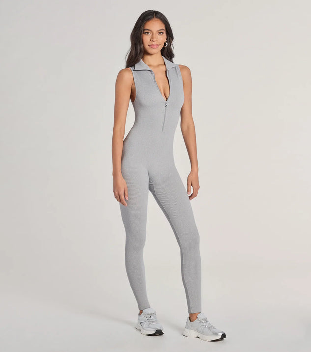 The Off Duty Chic Sleeveless Collared Zip-Up Catsuit is a trendy women's bottom in heather gray, designed with modern details and alluring textures to complete chic outfits for 2025.