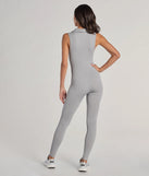 The Off Duty Chic Sleeveless Collared Zip-Up Catsuit is a trendy women's bottom in heather gray, designed with modern details and alluring textures to complete chic outfits for 2025.