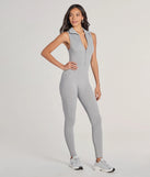 The Off Duty Chic Sleeveless Collared Zip-Up Catsuit is a trendy women's bottom in heather gray, designed with modern details and alluring textures to complete chic outfits for 2025.