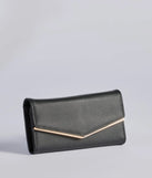 The Classically Chic Faux Leather Envelope Wristlet in black is a women's workwear essential with an elevated fabric and chic silhouette, ideal for layering and versatile enough to take your look from office chic to going-out ready!