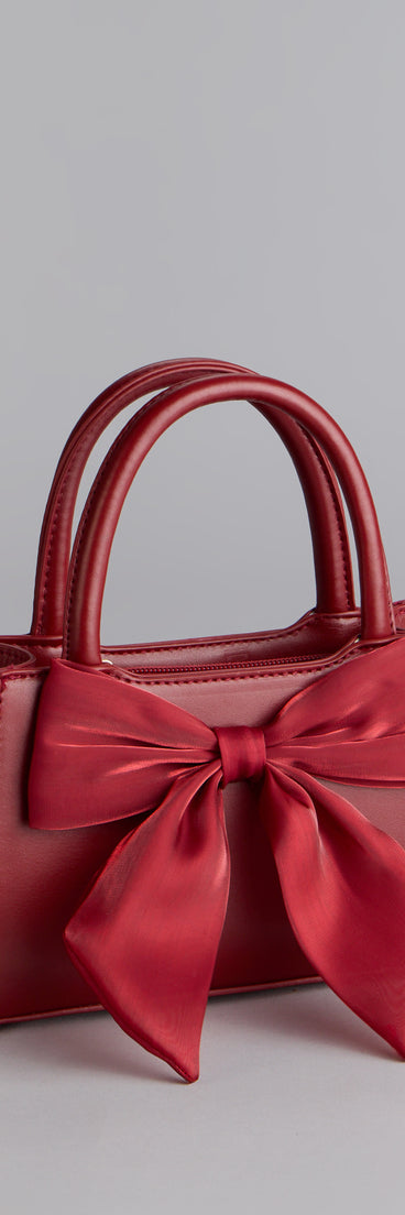 Style your vibe in seconds with the Tres Chic Tulle Bow Faux Leather Handbag in wine, a fashion accessories essential that completes any outfit with ease.