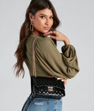 Quilted Verdict Crossbody Bag