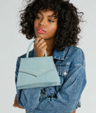 The Radiant Rhinestone Trim Denim Mini Bag in denim is a women's workwear essential with an elevated fabric and chic silhouette, ideal for layering and versatile enough to take your look from office chic to going-out ready!