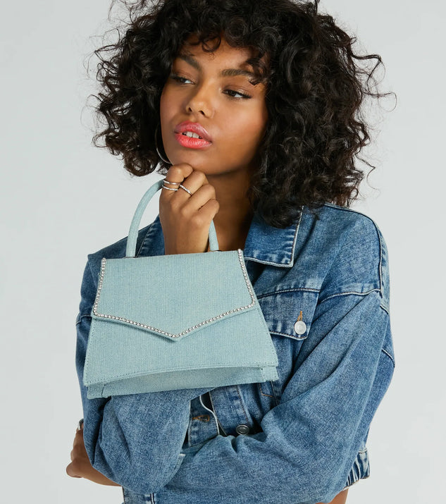 The Radiant Rhinestone Trim Denim Mini Bag in denim is a women's workwear essential with an elevated fabric and chic silhouette, ideal for layering and versatile enough to take your look from office chic to going-out ready!
