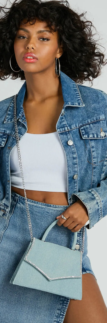 The Radiant Rhinestone Trim Denim Mini Bag in denim is a women's workwear piece offering a trendy style and unique accents, perfect for effortlessly creating an outfit-of-the-day look that transitions your office look to going-out ready.