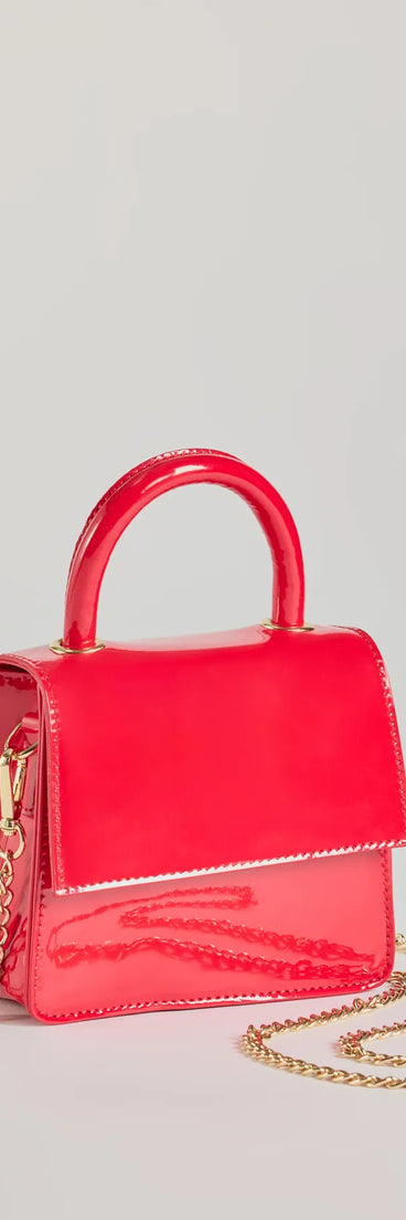 Get ready for any event with the Trendy Moment Faux Patent Leather Top Handle Mini Purse in red, an essential start to creating a versatile outfit for women for parties, cocktail hours, or Valentine's Day events.