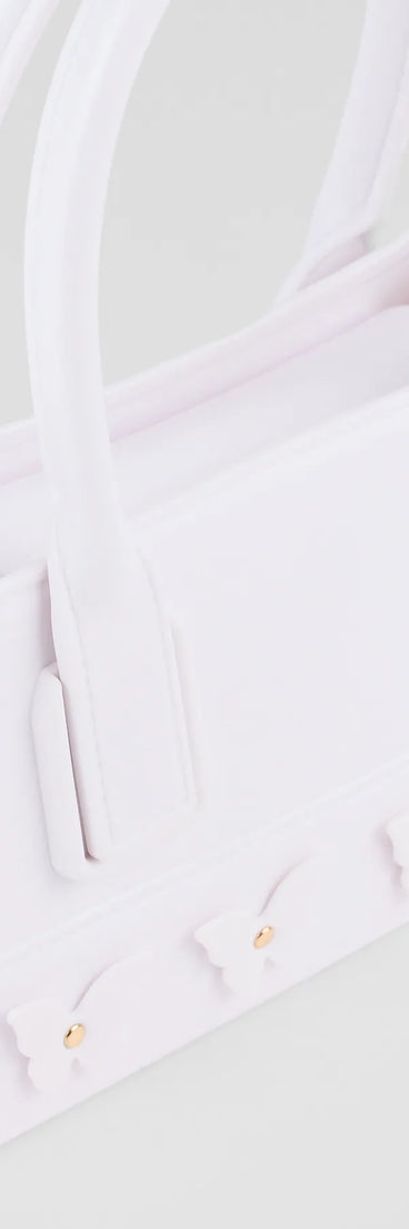 Stay on-trend this season with the Time To Fly Butterfly Jelly Tote Bag in white, a must-have for creating stylish and effortless spring outfits for women.