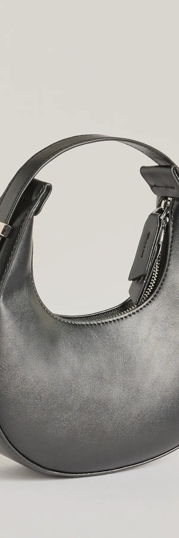 The Iconic Glam Half-Moon Shoulder Bag in black is a women's workwear essential with an elevated fabric and chic silhouette, ideal for layering and versatile enough to take your look from office chic to going-out ready!