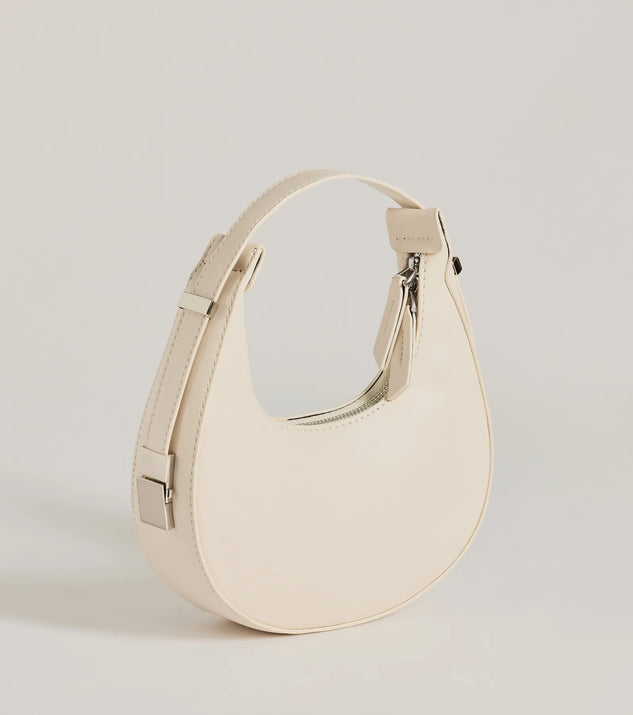 The Iconic Glam Half-Moon Shoulder Bag in ivory is a women's workwear essential with an elevated fabric and chic silhouette, ideal for layering and versatile enough to take your look from office chic to going-out ready!