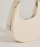 The Iconic Glam Half-Moon Shoulder Bag in ivory is a women's workwear piece offering a trendy style and unique accents, perfect for effortlessly creating an outfit-of-the-day look that transitions your office look to going-out ready.
