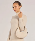 The Iconic Glam Half-Moon Shoulder Bag in ivory is a women's workwear piece offering a trendy style and unique accents, perfect for effortlessly creating an outfit-of-the-day look that transitions your office look to going-out ready.