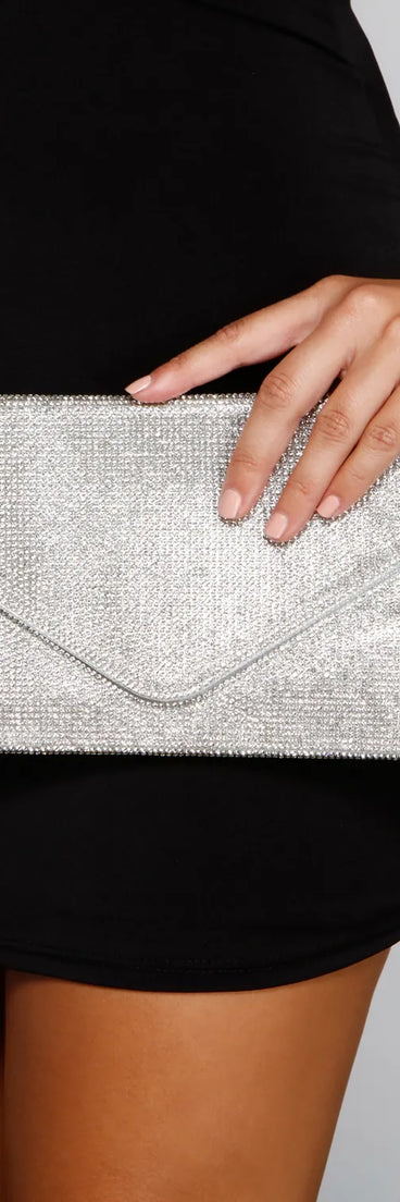 Celebrate in style with the Winner Is Envelope Clutch, a silver formal wedding guest dress featuring an elegant silhouette and luxe details, perfect for a black-tie celebration.