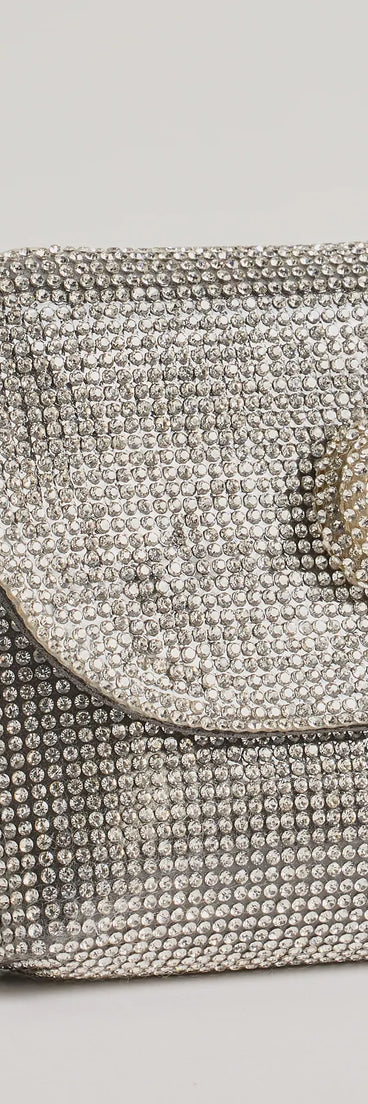 Get ready for any event with the Sparkle And Glow Rhinestone Bow Handbag in silver, an essential start to creating a versatile holiday outfit for women for holiday parties, cocktail hours, or NYE events.