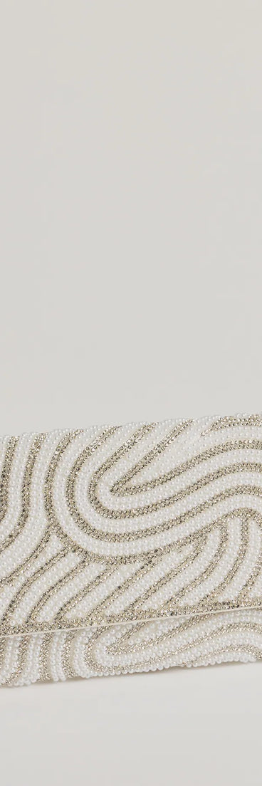 The Graceful Luxe Rhinestone And Faux Pearl Clutch helps create a chic women's white cocktail outfit with a trendy texture and stylish design, ideal for wedding guest cocktail outfits or dinner parties.