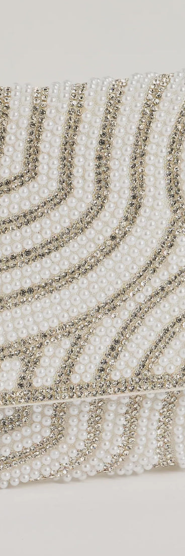 The Graceful Luxe Rhinestone And Faux Pearl Clutch helps create a chic women's white cocktail outfit with a trendy texture and stylish design, ideal for wedding guest cocktail outfits or dinner parties.