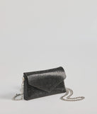 The Sparkle Effect Rhinestone Crossbody Purse helps create a chic women's black cocktail outfit with a trendy texture and stylish design, ideal for wedding guest cocktail outfits or dinner parties.