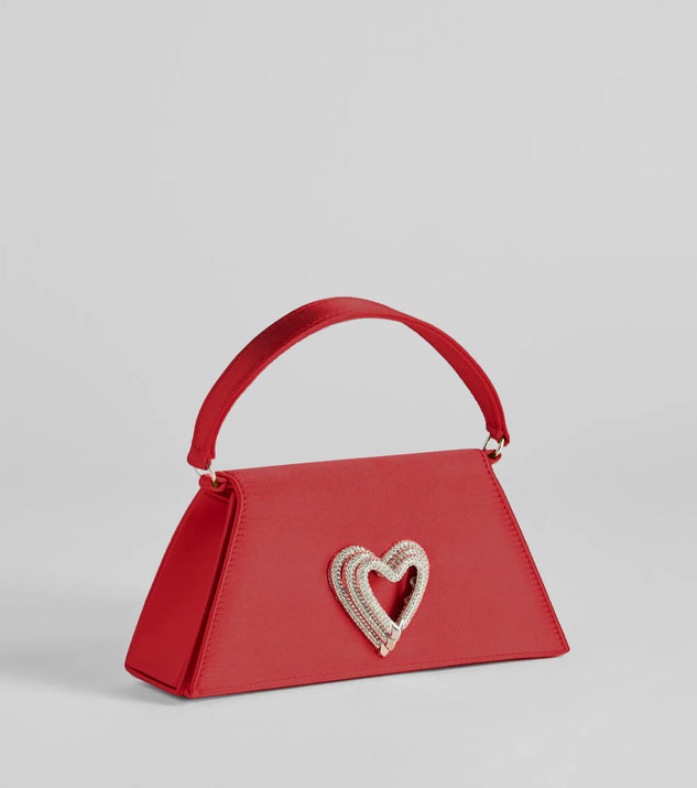Whether you're dressing up for a romantic date or a Galentine's event, the Sparkle Romance Rhinestone Heart Handbag in red is the perfect accessory to elevate your Valentine's Day outfit.