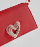 Whether you're dressing up for a romantic date or a Galentine's event, the Sparkle Romance Rhinestone Heart Handbag in red is the perfect accessory to elevate your Valentine's Day outfit.