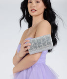 The Glam Soiree Rhinestone Baguette Clutch in silver brings sleek style to any graduation outfit, from cap and gown to after-party.