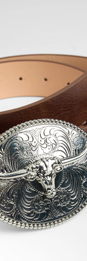 Style your vibe in seconds with the Prairie Tales Steer Buckle Belt in brown, a fashion accessories essential that completes any outfit with ease.