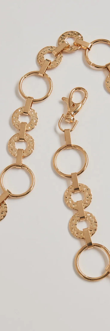 The Trendy Vibes Textured O-Ring Chain Belt in gold brings edge and energy to your vibe, ready to elevate any festival look or concert outfit.