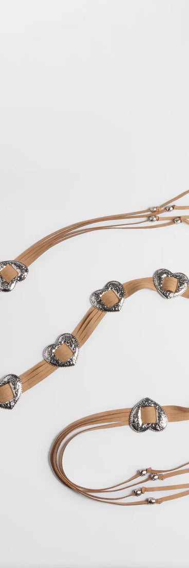 Style your vibe in seconds with the Wild Affair Heart Concho String Belt in tan, a fashion accessories essential that completes any outfit with ease.