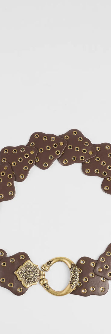 The Western Mood Statement Buckle Medallion Belt in brown brings edge and energy to your vibe, ready to elevate any festival look or concert outfit.