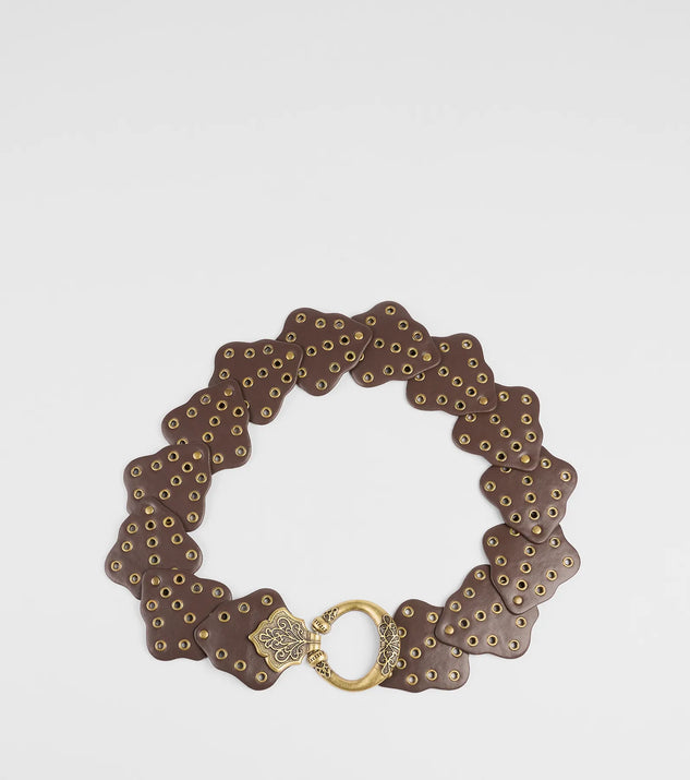 The Western Mood Statement Buckle Medallion Belt in brown brings edge and energy to your vibe, ready to elevate any festival look or concert outfit.