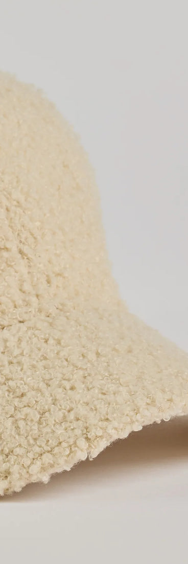 Add a touch of seasonal charm to your winter wardrobe with the Toasty Vibes Faux Sherpa Baseball Cap, a ivory cold-weather accessory that effortlessly completes your seasonal looks!