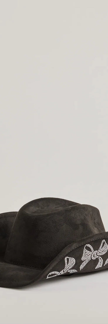 
Upgrade your style game for 2025 with the Sparkle On Rhinestone Bow Cowboy Hat in black, perfect for any fashion-forward wardrobe.