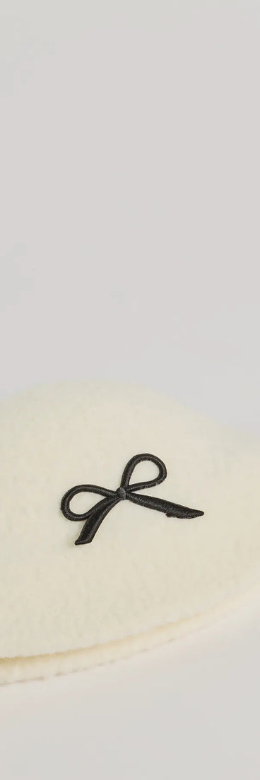 Add a touch of seasonal charm to your winter wardrobe with the Adorably Cozy Bow Detail Faux Wool Bucket Hat, a white cold-weather accessory that effortlessly completes your seasonal looks!