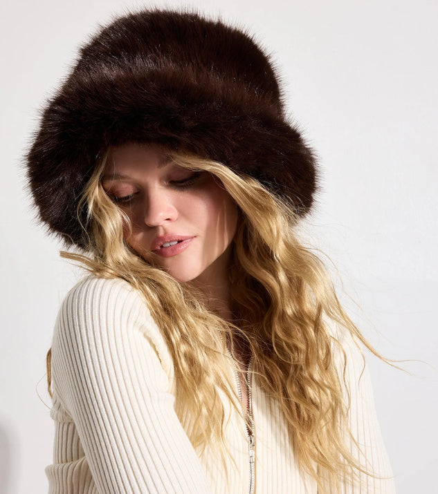 Add a touch of seasonal charm to your winter wardrobe with the Cozy Bliss Faux Fur Bucket Hat, a brown cold-weather accessory that effortlessly completes your seasonal looks!