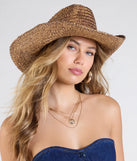 The Southern Belle Straw Cowboy Hat in brown brings edge and energy to your vibe, ready to elevate any festival look or concert outfit.