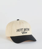 The Hot Mom Club Two-Tone Baseball Cap in multi-color brings edge and energy to your vibe, ready to elevate any festival look or concert outfit.