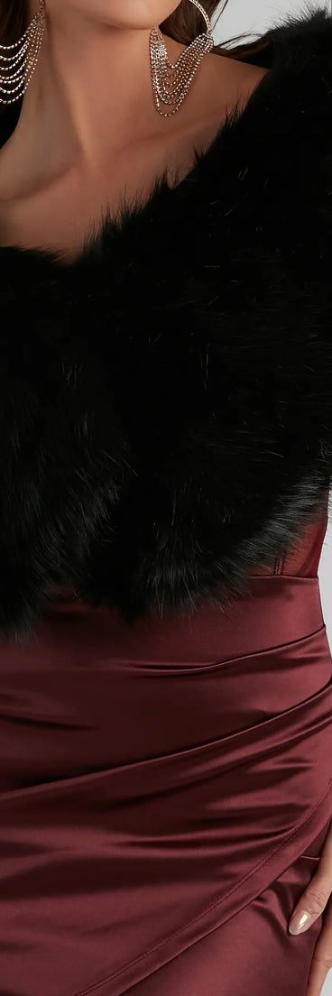 Get ready for any event with the Ms. Diva Faux Fur Shawl in black, an essential start to creating a versatile outfit for nightime parties, cocktail hours, or outdoor events.