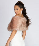 Get ready for any event with the Ms. Diva Faux Fur Shawl in mauve, an essential start to creating a versatile outfit for nightime parties, cocktail hours, or outdoor events.