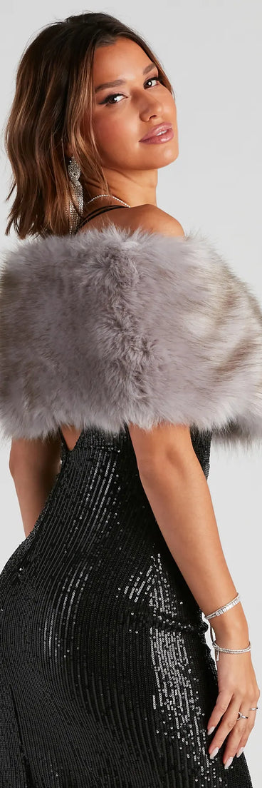 Get ready for any event with the Ms. Diva Faux Fur Shawl in gray, an essential start to creating a versatile outfit for nightime parties, cocktail hours, or outdoor events.