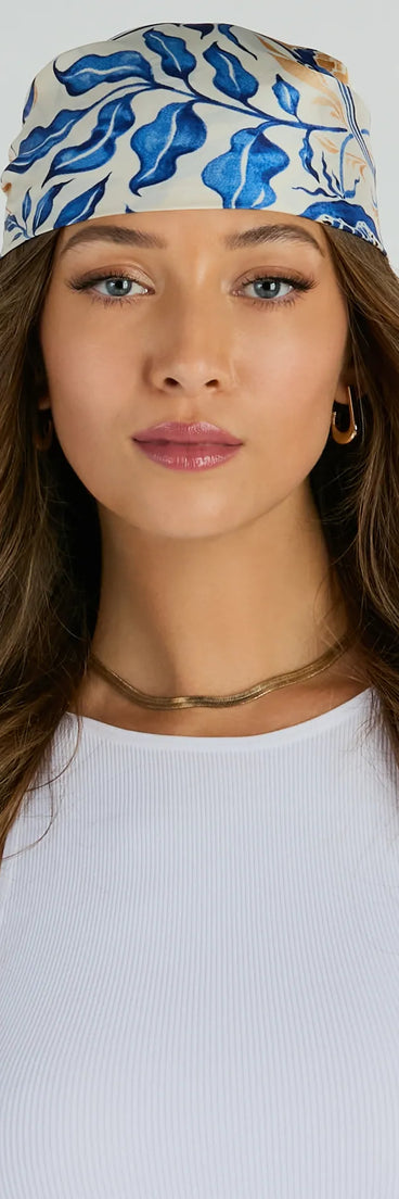 The Radiant Accent Floral Boho Satin Scarf in multi-color brings edge and energy to your vibe, ready to elevate any festival look or concert outfit.