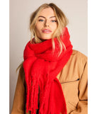 Add a touch of seasonal charm to your winter wardrobe with the Layered Luxe Oversized Blanket Scarf, a red cold-weather accessory that effortlessly completes your seasonal looks!
