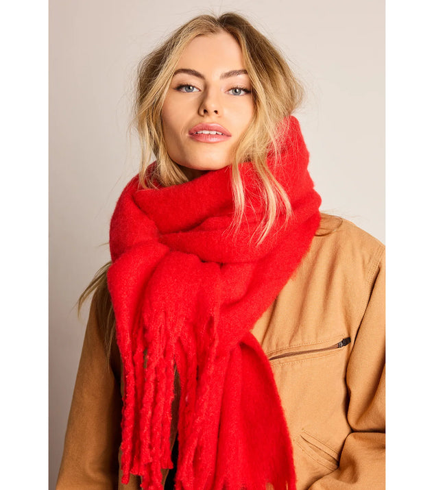 Add a touch of seasonal charm to your winter wardrobe with the Layered Luxe Oversized Blanket Scarf, a red cold-weather accessory that effortlessly completes your seasonal looks!