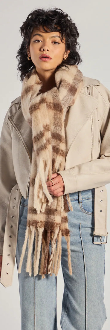 Add a touch of seasonal charm to your winter wardrobe with the Plaid Moment Blanket Scarf, a cold-weather accessory that effortlessly completes your seasonal looks!