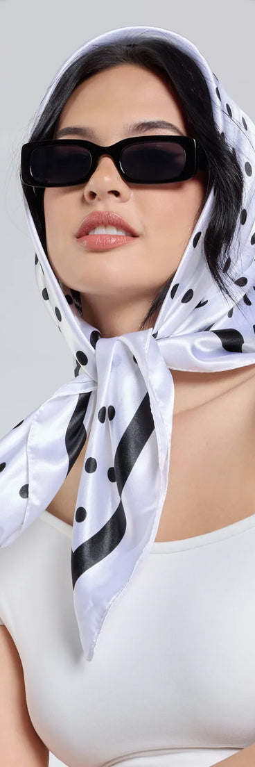 Stay on-trend this season with the Dotted Darling Polka Dot Satin Scarf in white, a must-have for creating stylish and effortless spring outfits for women.